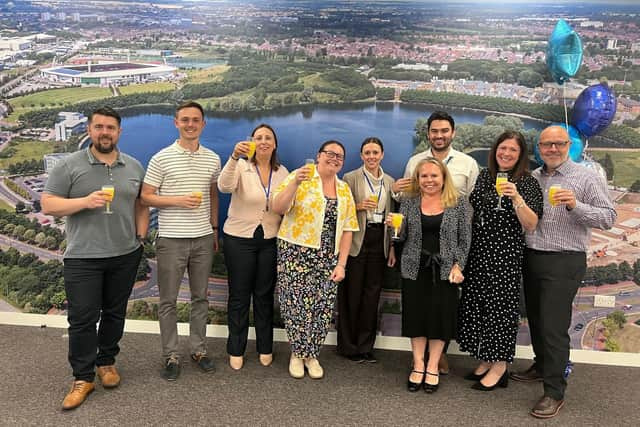 A team of Hays employees celebrating the opening of the new Doncaster offices